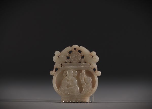 China - White jade pendant with Guanyin design, Ming period.