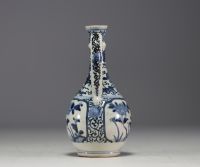 Japan - White and blue porcelain jug with floral decoration, 17th century.