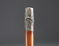 China - Silver cane with dragon decoration, late 19th century.