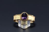 Set in 18k yellow gold and amethyst comprising a pendant, a bracelet, a ring and a pair of earrings, total weight 150g.