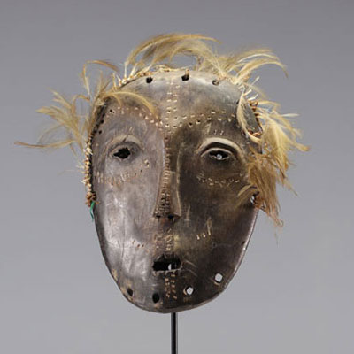 Carved wood and feather Lega mask