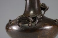 China - Bronze vase decorated with dragons in relief, Ming period.