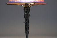 Muller Frères Lunéville - Art Nouveau mushroom lamp, hammered metal base with vine decoration, colored glass cup, signed.