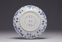 China - Blue-white porcelain plate with floral decoration, Kangxi mark.