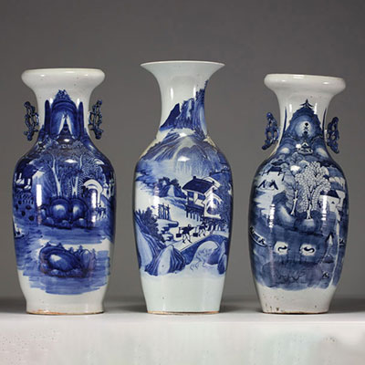 China - Set of three white and blue porcelain vases decorated with landscapes.