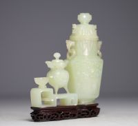 China - Jadeite sculpture representing two covered pots on a wooden base.