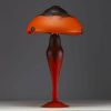 Charles SCHNEIDER (1881-1953) Mushroom lamp in orange-red marbled glass, signed on the foot.