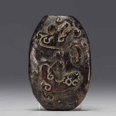 China - Carved jade pendant with Chilon decoration.