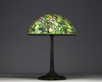 TIFFANY STUDIOS ‘New York’ 1900 - Table lamp with bronze base and floral glass mosaic shade, signed and numbered under the base.