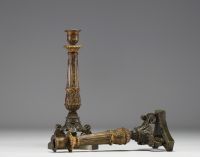 A pair of candlesticks in bronze with a double patina from the Charles X period.