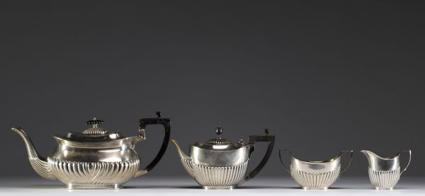 Solid silver tea and coffee service with English hallmarks.