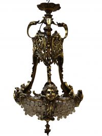 Lustre montgolfière, monture en bronze à décor de visage de chérubins, perles de verre, XIXème.