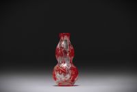 China - Snuffbox in multi-layered glass, clear background with red flowers.