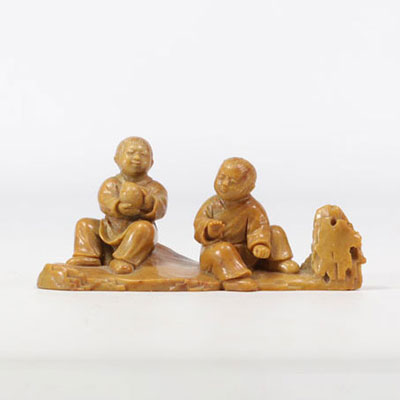 Hard stone sculpture with children's figures