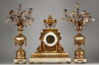 Imposing Louis XVI ormolu and white marble clock and candelabra.