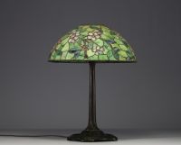 TIFFANY STUDIOS ‘New York’ 1900 - Table lamp with bronze base and floral glass mosaic shade, signed and numbered under the base.