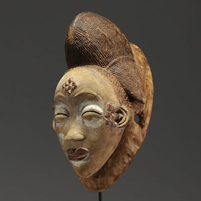 Gabon - Punu mask in carved wood.