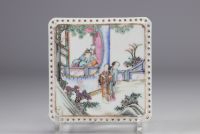 China - A pair of Famille Rose porcelain plaques decorated with figures.