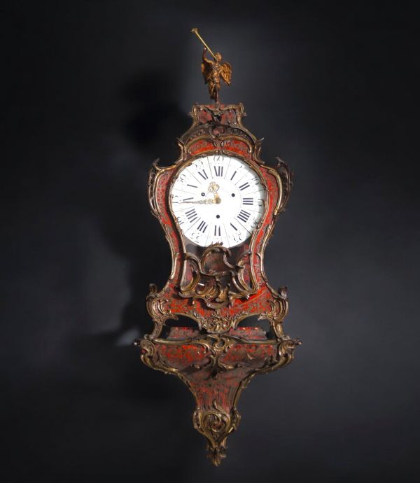 Large wall-mounted cartel and its console inlaid with scales and brass, enamelled dial signed Jolly in Paris.