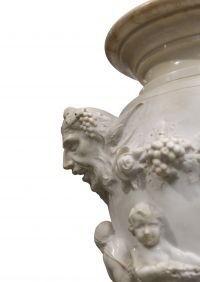 Imposing Carrara marble urn decorated with Satyrs and Putti in the Clodion style, first half of the 18th century.