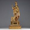 ‘Saint Florian' Gilded stuccoed wood sculpture on a base, 18th century.