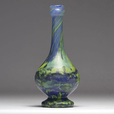 Vase in the shape of a bottle in glass paste