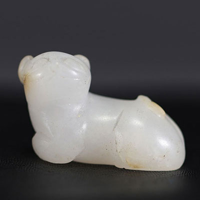 China - Small white jade pendant representing a cat, 18th century.