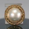 Large pearl mounted on an 18k yellow gold brooch that can also be worn as a pendant, total weight 16g.