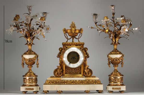 Imposing Louis XVI ormolu and white marble clock and candelabra.