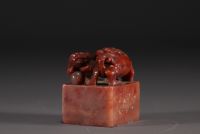 China - Carved stone seal surmounted by two lions, calligraphy, Qing period.