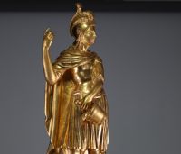 ‘Saint Florian' Gilded stuccoed wood sculpture on a base, 18th century.