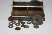 China - Set of thirteen coins from different periods and a silver-plated metal box.