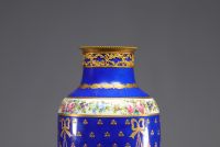 Blue Sèvres porcelain vase decorated with flowers and mounted in bronze