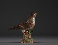 Meissen - Porcelain bird, swords mark under the piece.
