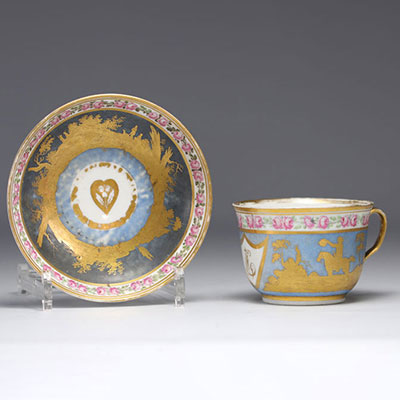 Paris porcelain cup decorated with a gilded landscape from 18th century