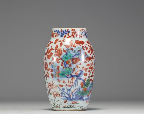 China - A polychrome porcelain vase decorated with bamboos, flowers and birds, 17th century.