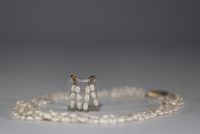 Freshwater pearl set comprising a five-row necklace and a pair of earrings, gold-plated clasp.