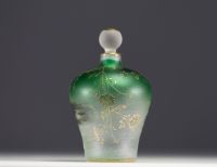 DAUM Nancy - Iridescent glass perfume bottle with enamelled and gold lacustre decoration, signed under the piece.