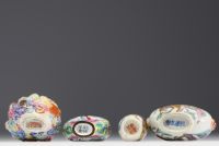 China - Set of four snuffboxes, three in polychrome porcelain and one in cloisonné enamel.