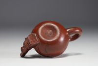 China - Yixing clay teapot in the shape of a monkey, debossed mark on the underside.