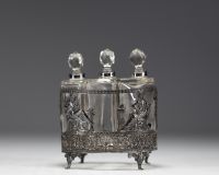 Three glass perfume bottles with silver mountings in the Empire style.