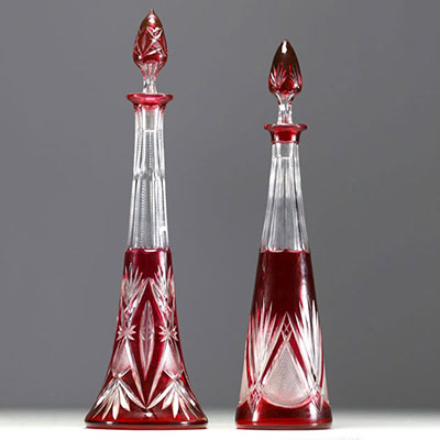 Val Saint Lambert - Set of two Art Deco decanters in red lined and cut crystal.