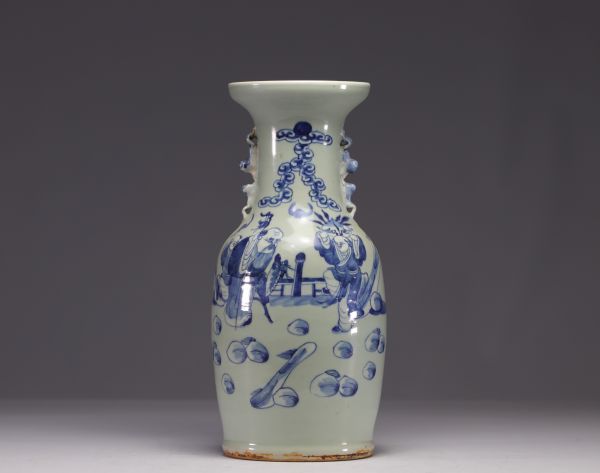 China - A blue-white porcelain vase on a celadon background decorated with figures, 19th century.