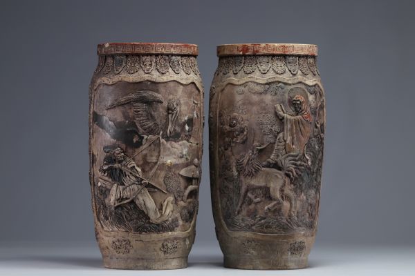 Japan - Pair of stoneware vases decorated with figures and animals, Meiji period.