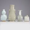 China - Set of four celadon porcelain vases.