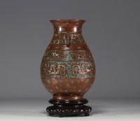 China - Hu porcelain vase in imitation of archaic bronze vases, chimera head handles, frieze in imitation cloisonné enamels on a bronze background, mark under the piece.