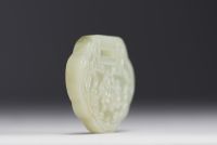 China - Jade pendant decorated with characters and calligraphy.
