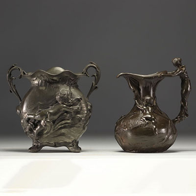 Set of a polished pewter Art Nouveau jug and vase, circa 1900.