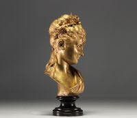 Bust of a young girl in bronze with gilded patina, published by the 