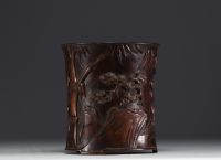 China - A carved wooden brush pot with bamboo and bird decoration, 19th-20th century.